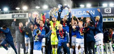 Players of Norwegian soccer club Stroemsgodset celebrate